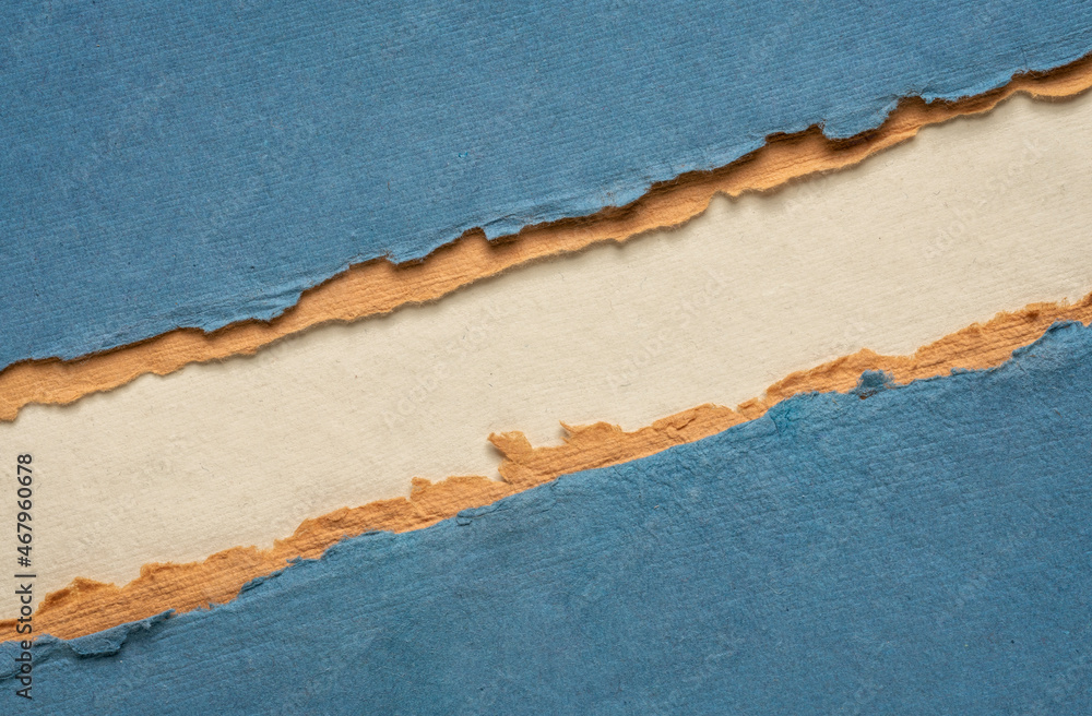 paper abstract in blue, orange and beige with a copy space - sheets of handmade paper, diagonal blank web banner paper abstract in blue, orange and beige with a copy space - sheets of handmade paper, diagonal blank web banner
