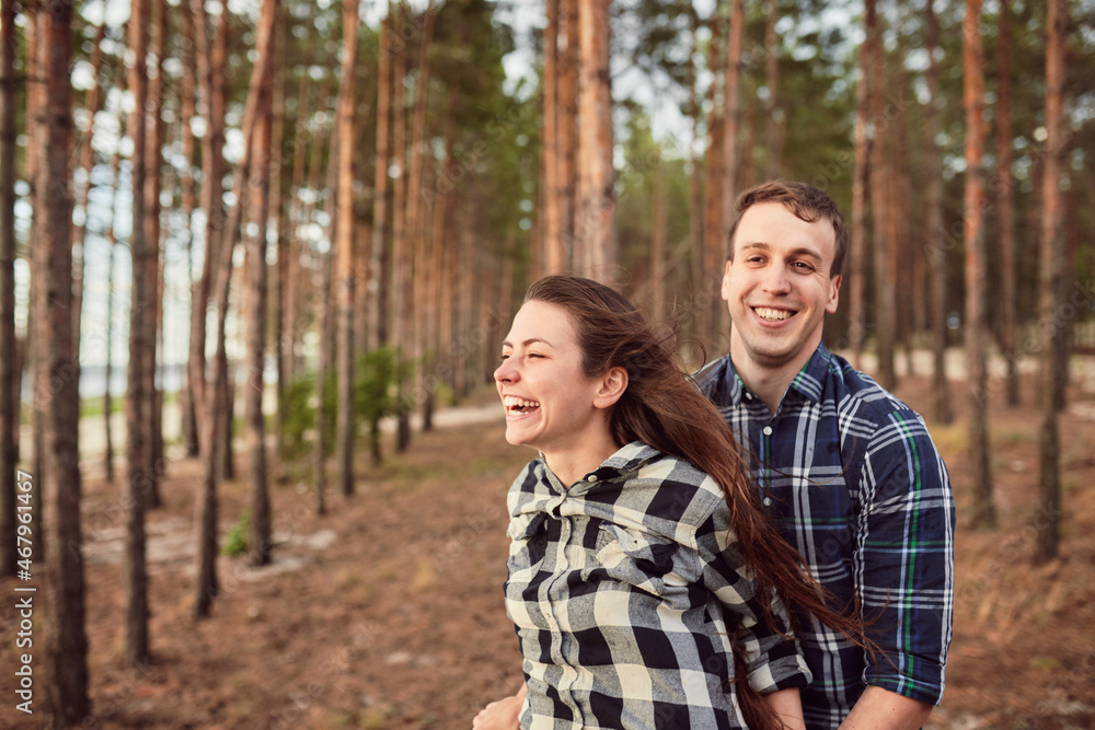 Happy couple. Loving couple enjoying in moments of happiness in the park. Love and tenderness, dating, romance.