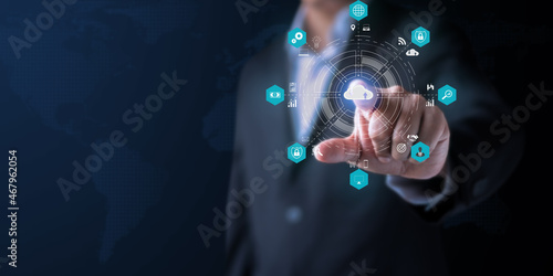 Businessman showing hologram, analyzing sales data and economic. Analysis strategy sale marketing economic data online network connection. Business finance and marketing digital technology concept.