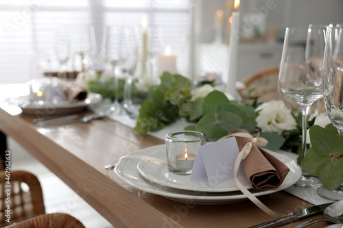 Festive table setting with beautiful tableware and decor indoors