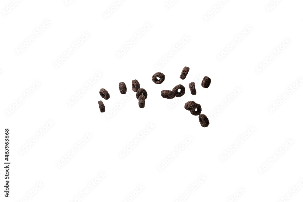 Chocolate rings cereal spill out into a bowl. Breakfast. Chocolate rings cereal spill out into a bowl. Breakfast.