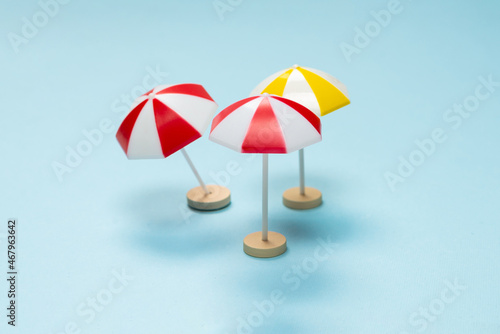 Wallpaper Mural Yellow and red umbrella on a blue background. Torontodigital.ca