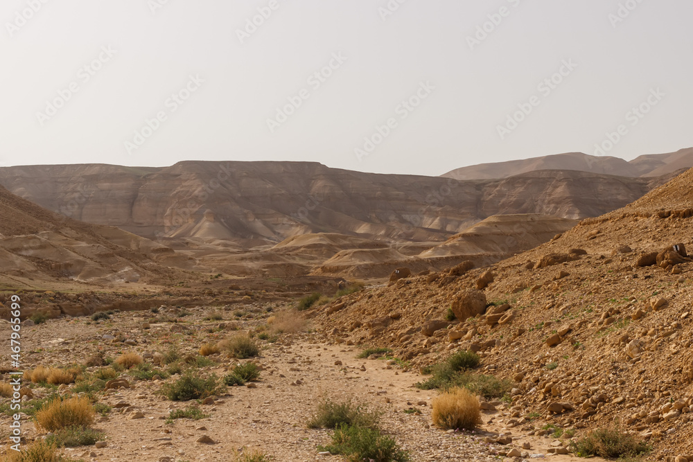 Valley and rocks in the Judean desert in Israel Valley and rocks in the Judean desert in Israel