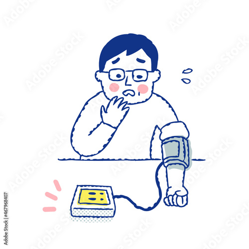 血圧測定の結果に焦る男性