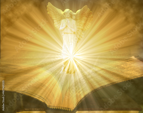 Angel on Open Lighted Bible