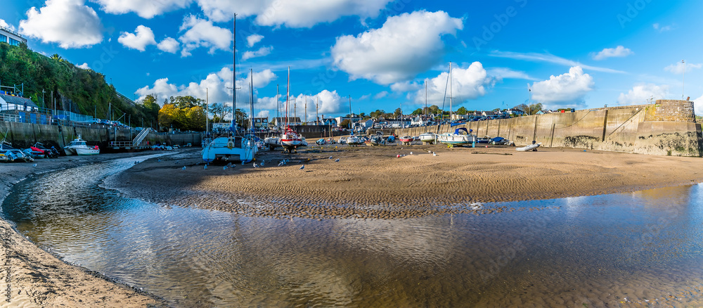 A panorama view across the harbour at Saundersfoot, South Wales on a sunny day