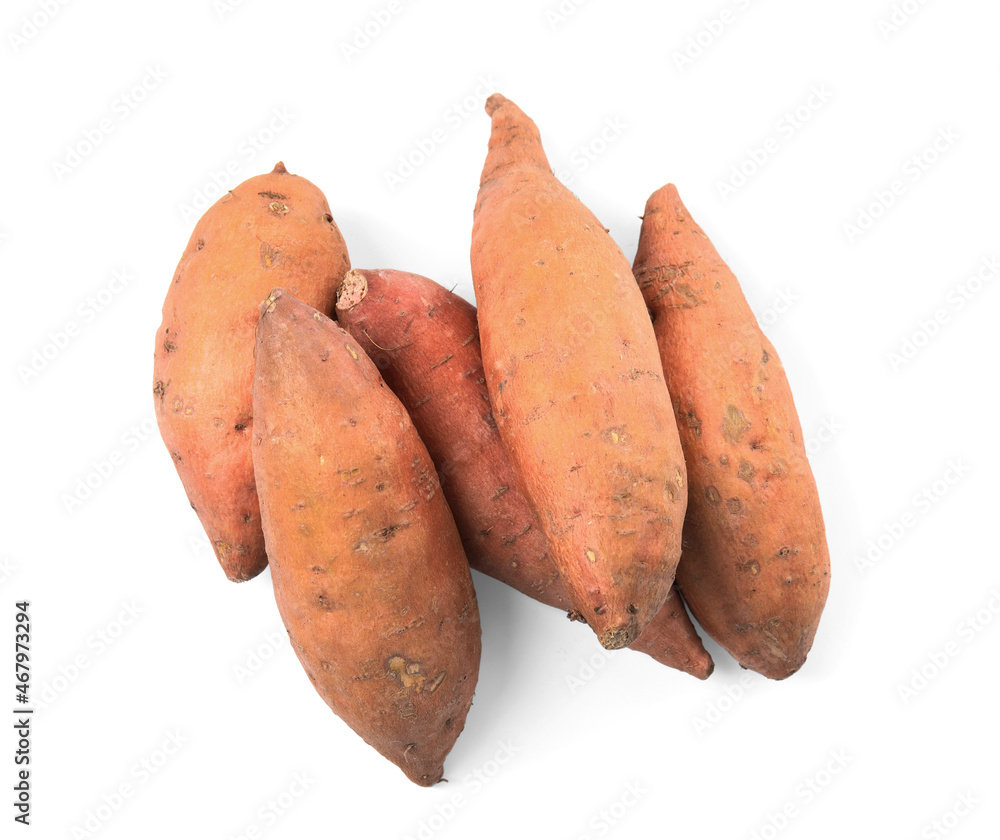 Heap of whole ripe sweet potatoes on white background, top view
