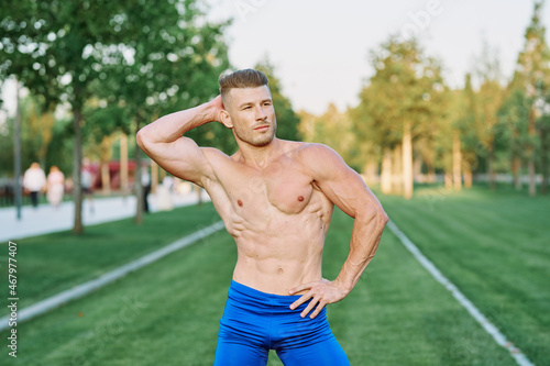 Muscled Man Doing Exercises Outdoor Fitness Summer