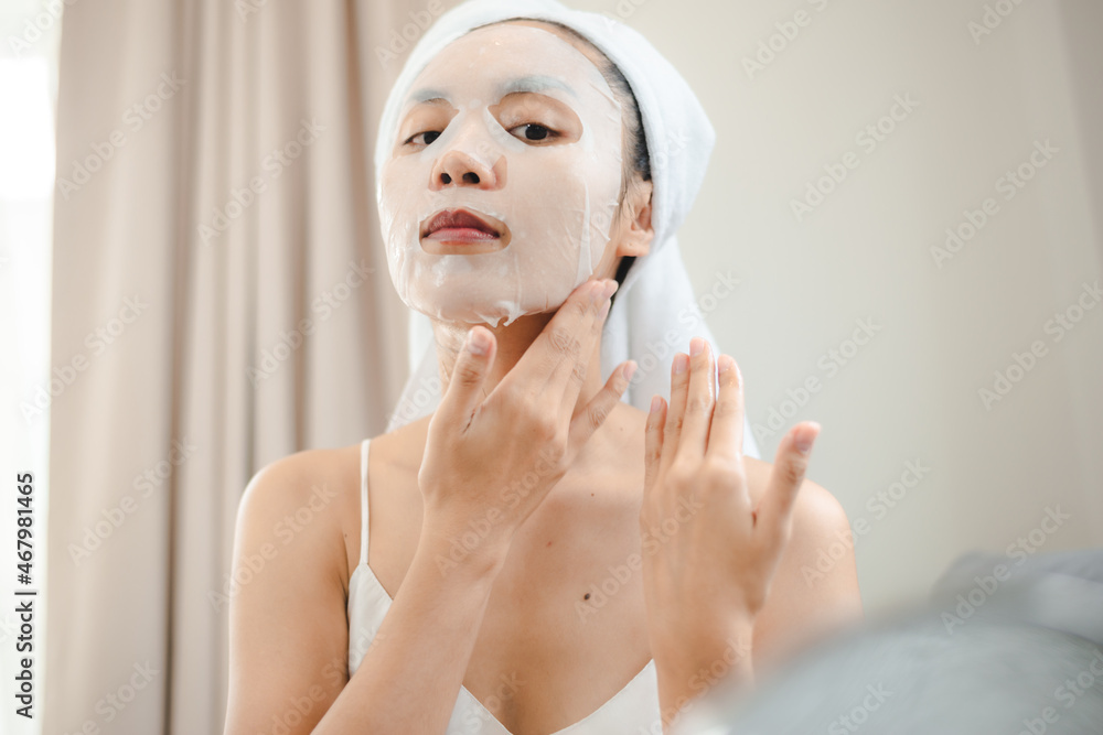 Asian woman with cosmetic face mask skincare to body healthy treatment spa Asian woman with cosmetic face mask skincare to body healthy treatment spa