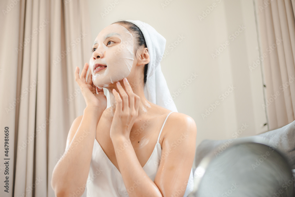 Asian woman with cosmetic face mask skincare to body healthy treatment spa Asian woman with cosmetic face mask skincare to body healthy treatment spa