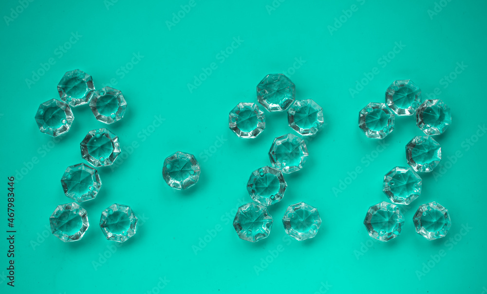 The numbers 2022 are lined with transparent crystals. New Year 2022. Background for the new year. selective focus