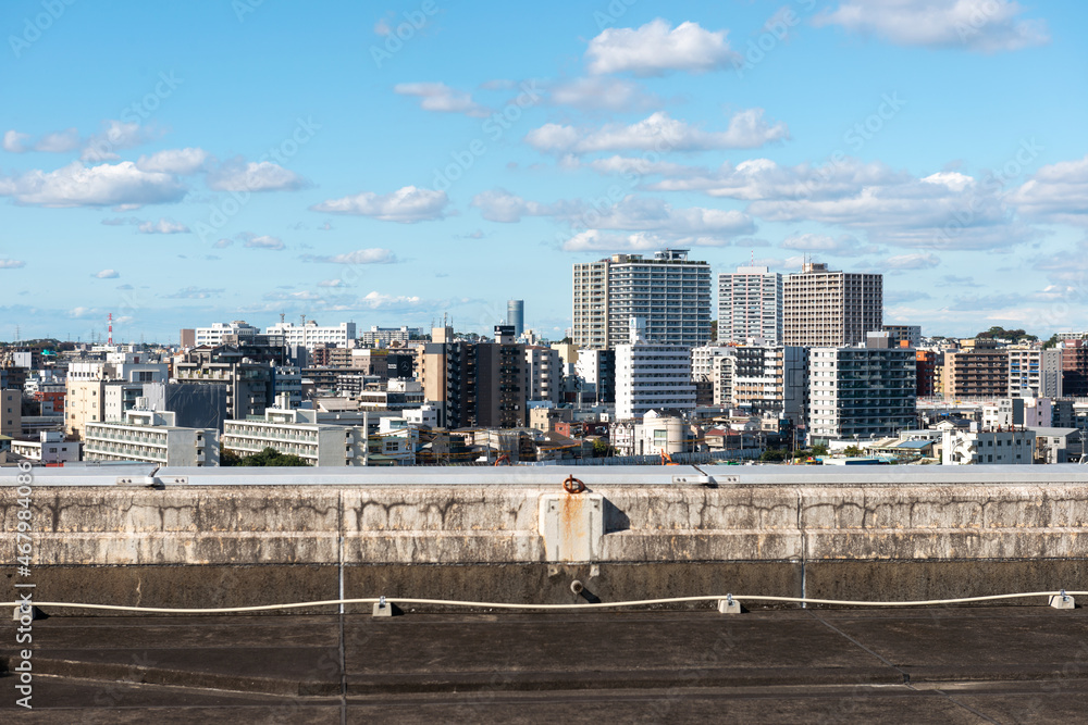 Naklejka premium ビルの屋上から見た都市風景の街並み