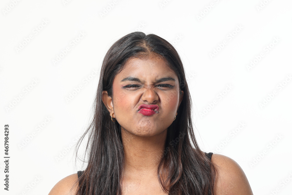 Young attractive Asian Indian woman pose face body expression mode emotion on white background lips kiss Young attractive Asian Indian woman pose face body expression mode emotion on white background lips kiss
