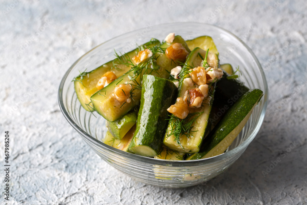 Green zucchini salad with walnuts and dill Green zucchini salad with walnuts and dill