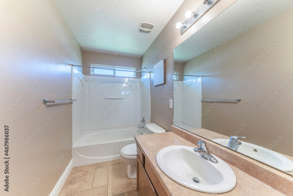 Traditional bathroom interior with antiqued limestone flooring Traditional bathroom interior with antiqued limestone flooring