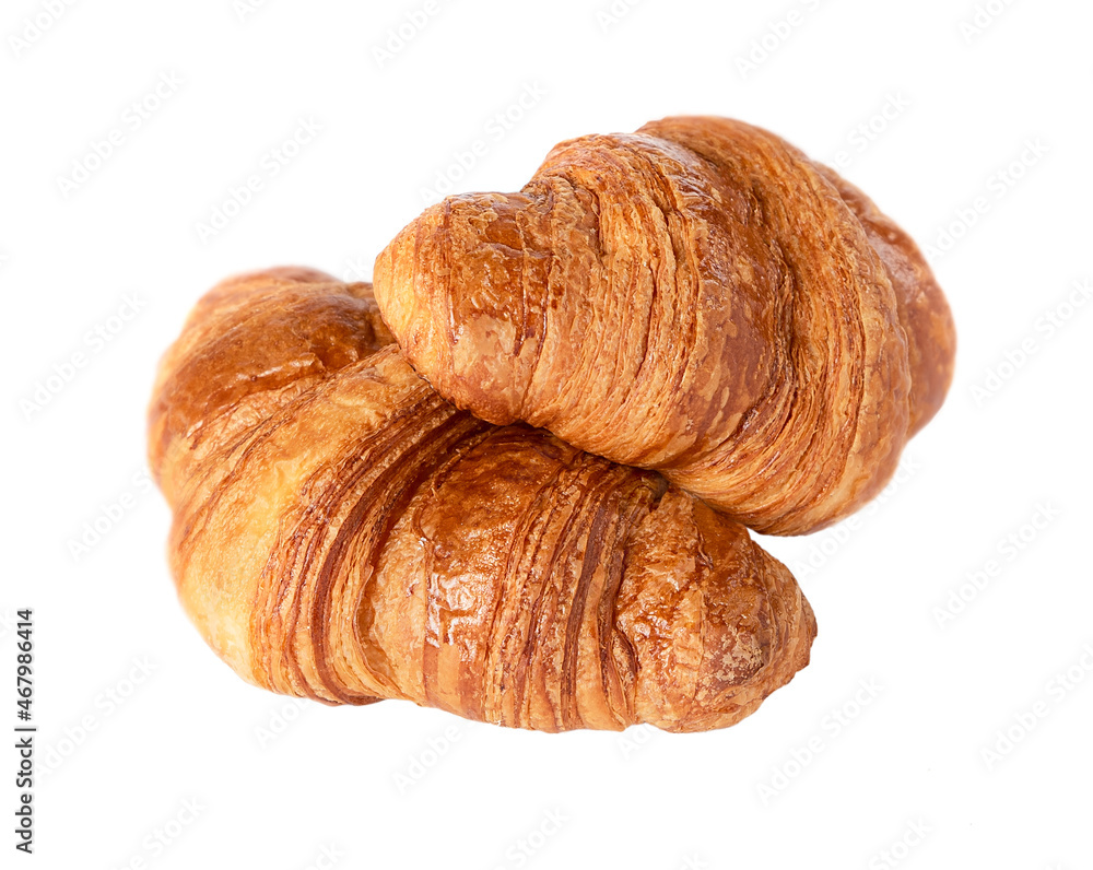 Two French croissants isolated on white background.