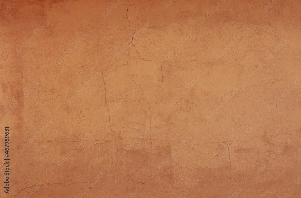 Orange color old grunge wall concrete texture as background.