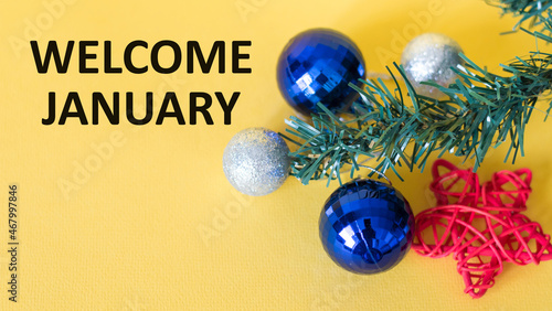 welcome january text on a yellow background, new year holiday, christmas