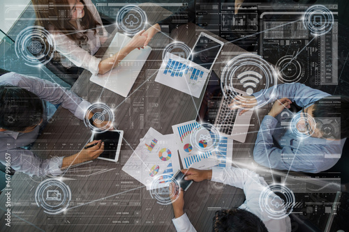 Obraz na płótnie technology digital virtual screen and Wireless communication connecting over the Top view of Business People Group on a Meeting in the modern office, technology business internet of thing concept w salonie
