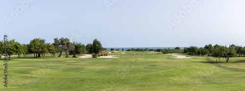 Fototapeta Naklejka Na Ścianę i Meble -  Beautiful panoramic view of a golf course in the Ria Formosa lagoon, Algarve 