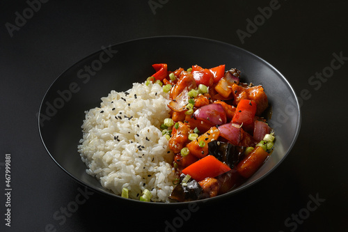 asian rice on a black background photo