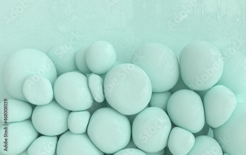 Dynamic abstract pastel colored 3d rendering background with soft spheres.