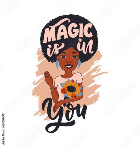 The Afro girl with bouquet flowers and quote, magic is in you. The woman hugging sunflowe photo