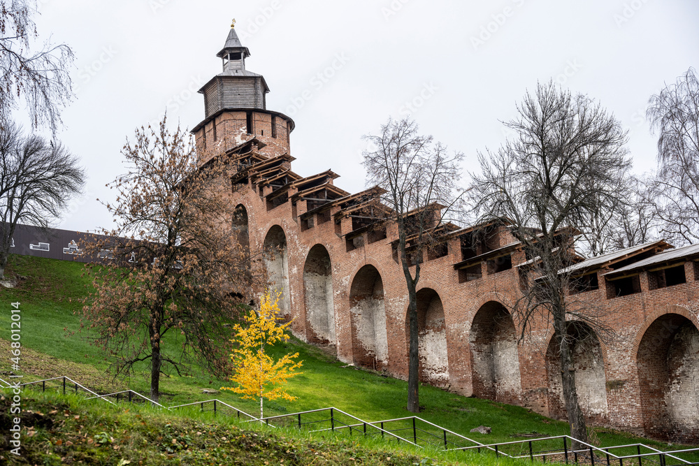ancient unique Nizhny Novgorod Kremlin made of red stone on a cloudy autumn day