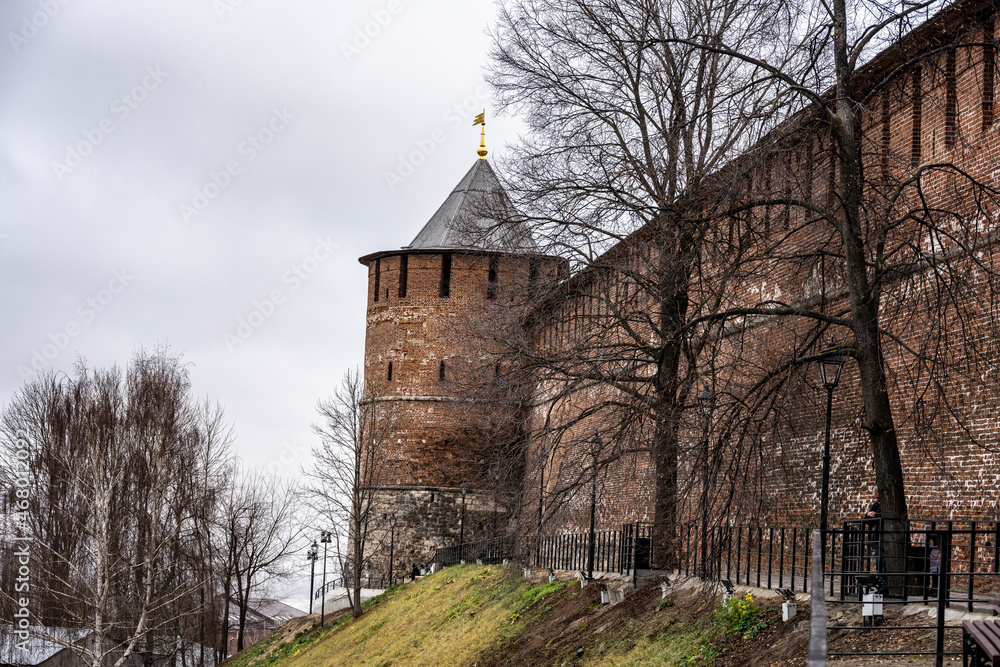 ancient unique Nizhny Novgorod Kremlin made of red stone on a cloudy autumn day