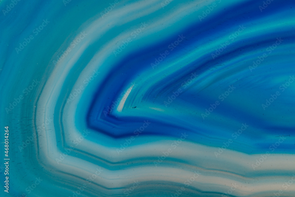 Macro mineral stone Blue Agate breed a white background Macro mineral stone Blue Agate breed a white background