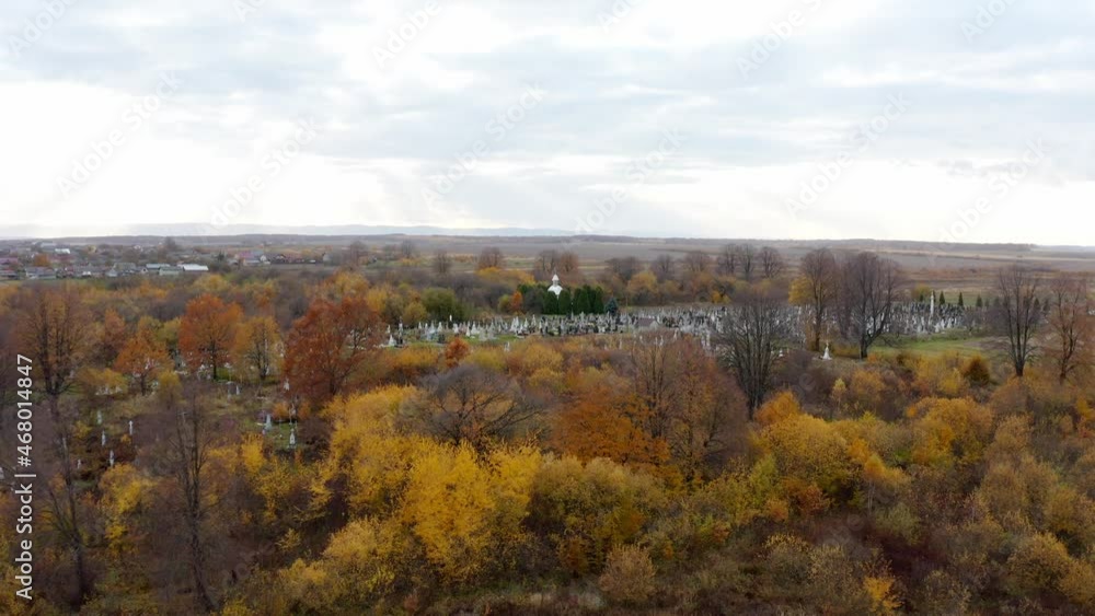 Cemetery in the middle of trees on the outskirts of the village. Autumn day Cemetery in the middle of trees on the outskirts of the village. Autumn day