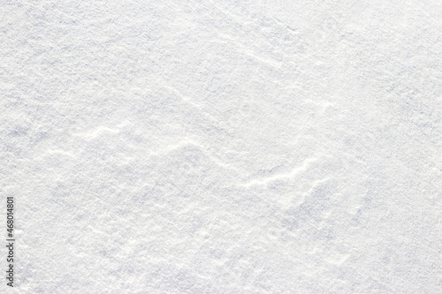 Snow texture with wavy solid surface, winter background
