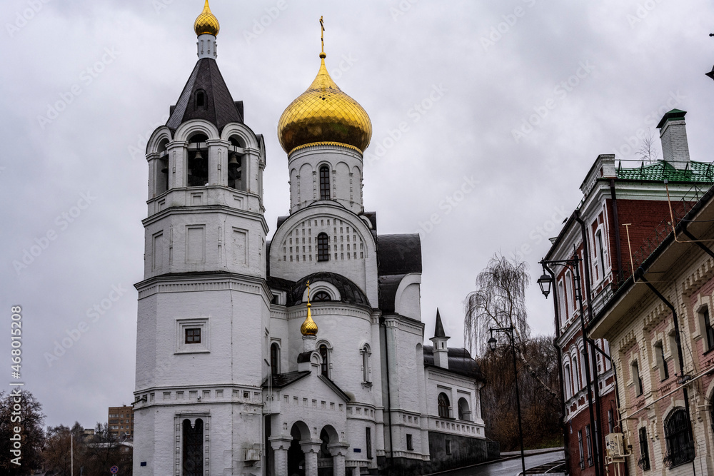 old beautiful Orthodox church in the old district of Nizhny Novgorod on a cloudy autumn day 