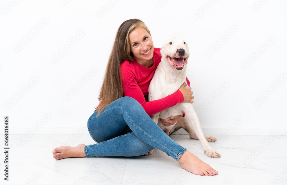 Young bull terrier dog over isolated background Young bull terrier dog over isolated background