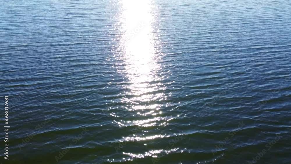 Reflection of a sun path in sea blue water Reflection of a sun path in sea blue water