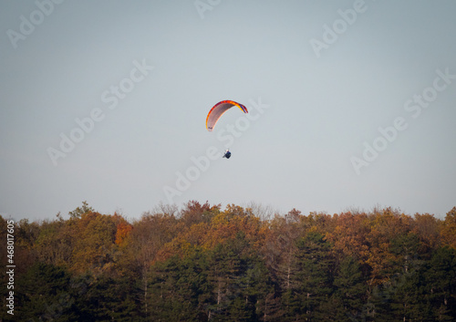A paraglider above jena at summer. copy space
