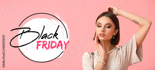 Beautiful woman with text BLACK FRIDAY on pink background
