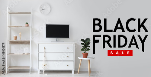 Interior of light living room with text BLACK FRIDAY SALE