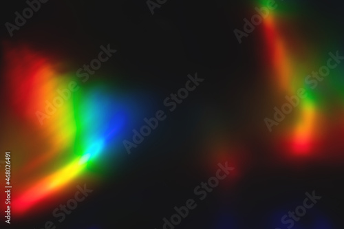 Blur colorful rainbow crystal light leaks on black background. Defocused abstract multicolored retro film lens flare bokeh analog photo overlay or screen filter effect. Glow Vintage prism colors photo