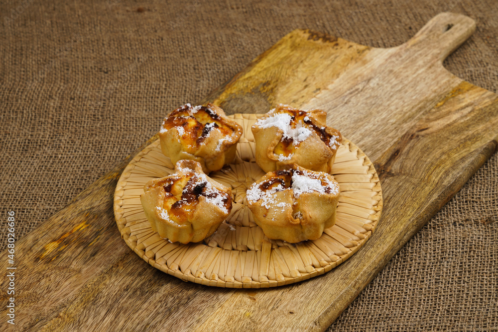 Traditional italian pastries soffioni on a cutting rustic board. Traditional italian pastries soffioni on a cutting rustic board.