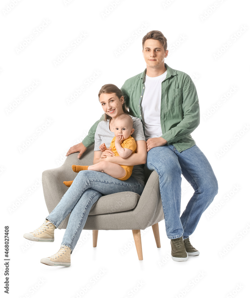 Young parents with little baby sitting in armchair on white background Young parents with little baby sitting in armchair on white background