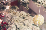 Close up of gold Christmas tree decorations