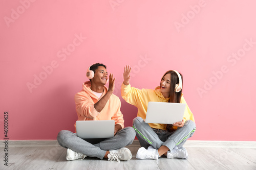 Stylish young couple in hoo...