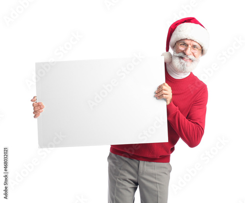Stylish mature man in Santa...