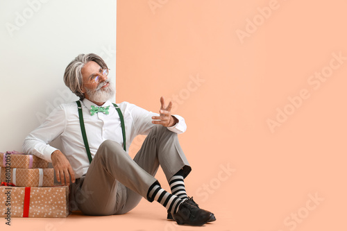 Stylish mature man with bla...