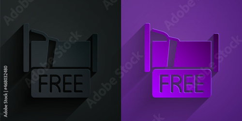 Paper cut Free overnight stay house icon isolated on black on purple background. Paper art style. Vector