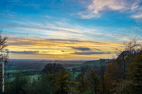 scenic Westerly view as the golden sun sets over Oare and across the Pewsey Vale valley  North Wessex Downs AONB