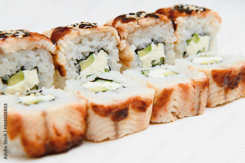 Japanese seafood sushi , roll on a white background Japanese seafood sushi , roll on a white background