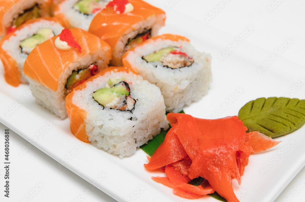 Japanese seafood sushi , roll on a white background Japanese seafood sushi , roll on a white background