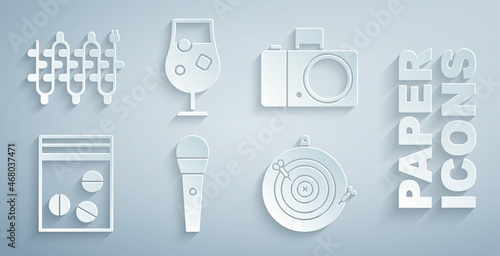 Set Karaoke microphone, Photo camera, Plastic bag of drug, Classic dart board and arrow, Cocktail alcohol drink and Christmas lights icon. Vector